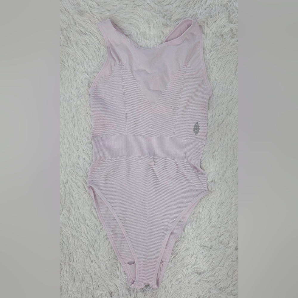 FP Movement by Free People Light Pink Ribbed One-Piece Bodysuit